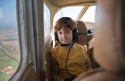 Happy Kid During Aircraft Ride