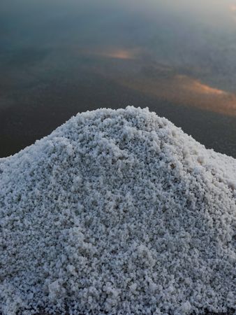 Salt mound on the edge of its salt pan