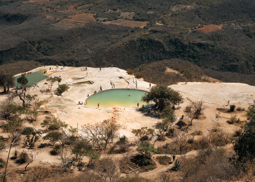 People swimming in mountain spring pools in Oaxaca