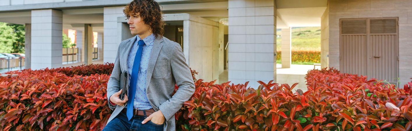 Businessman posing in the street