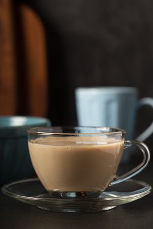 Cup of coffee with creamy milk.