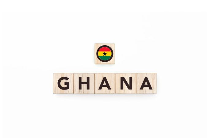 Wooden blocks bearing the name and flag of Ghana.