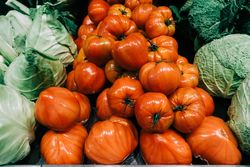 Heap of fresh tomatoes and cabbage