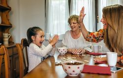 Little girl winning domino