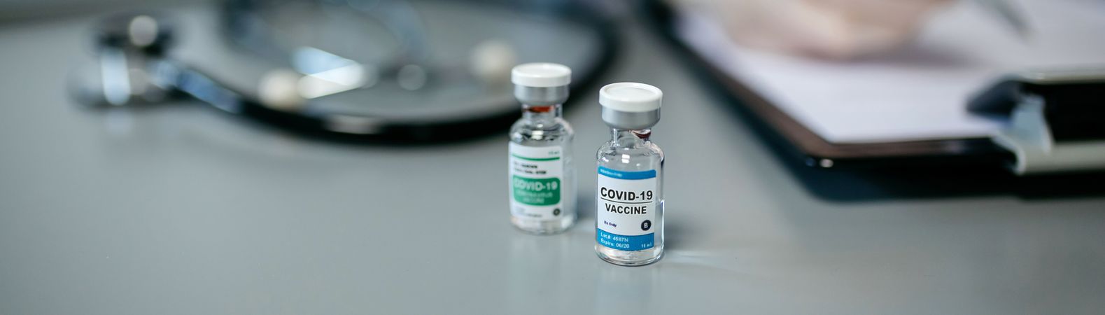 Two different vials of coronavirus vaccine