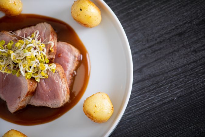Duroc sirloin with orange ginger soy and potatoes