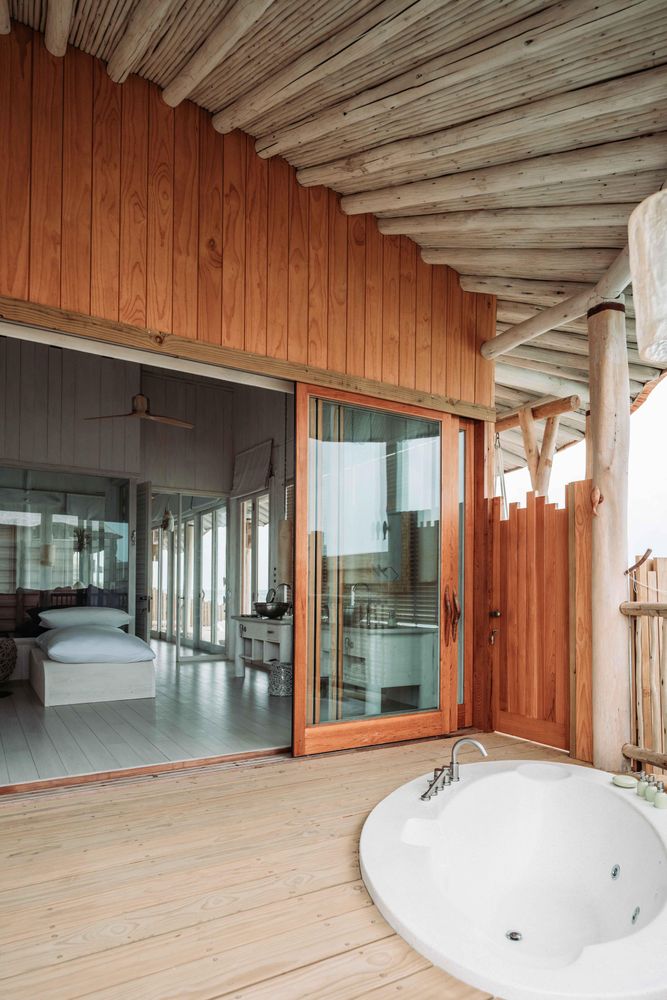 Interior view of bedroom with bathtub