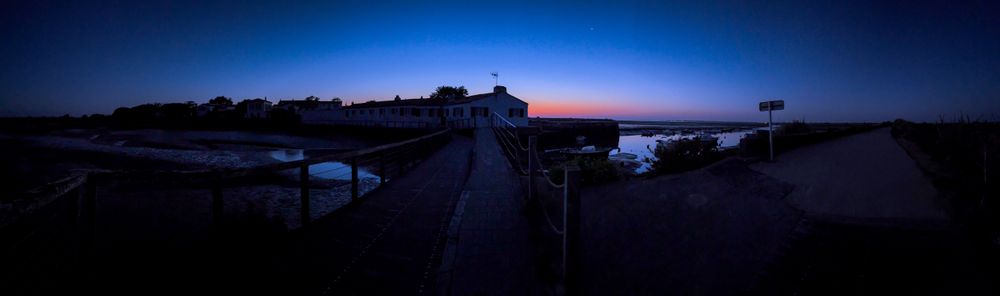 Panoramic at twilight of the Tide Mill of Port de Loix, France