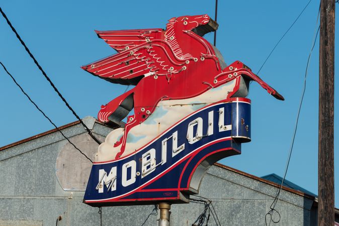 Vintage Mobil pegasus (flying horse) gas station insignia along a road in East Texas