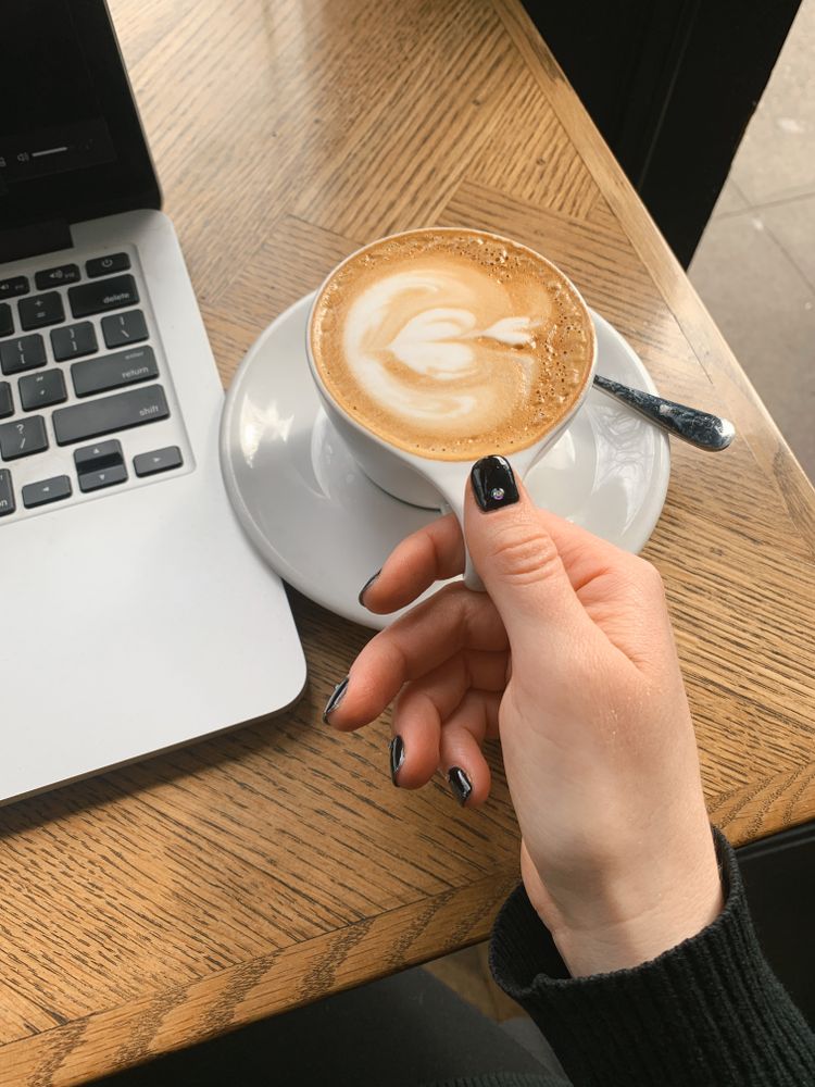 Woman holding coffee mug