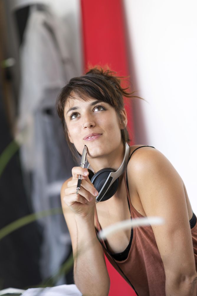 Thoughtful female in home office