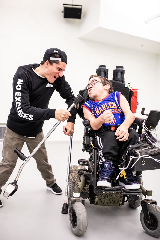 MONTREAL, QUEBEC, CANADA – April 14 2019- Two men joking with each other