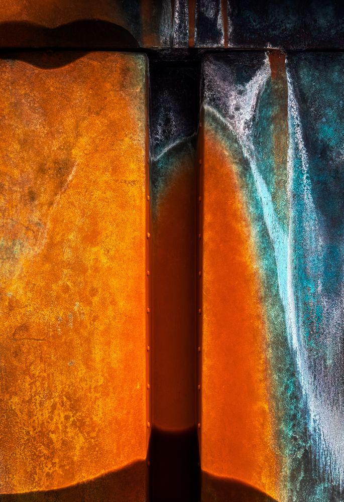 Close up of green and orange corrosion