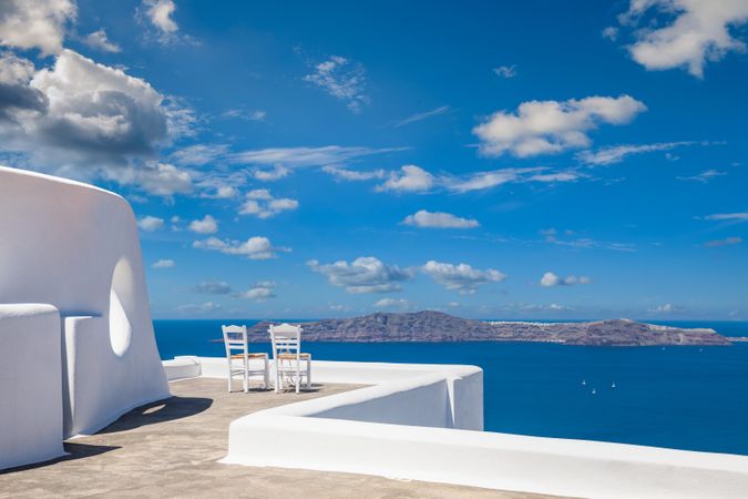 Patio with two chairs overlooking the Aegean Sea