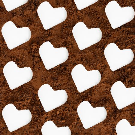 Pattern of hearts in brown dust