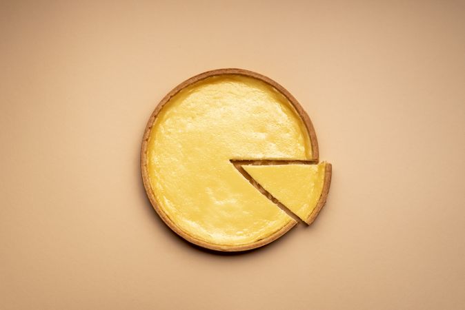 Cheesecake on a cream-colored background