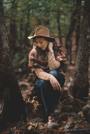 Young woman relaxing in forest