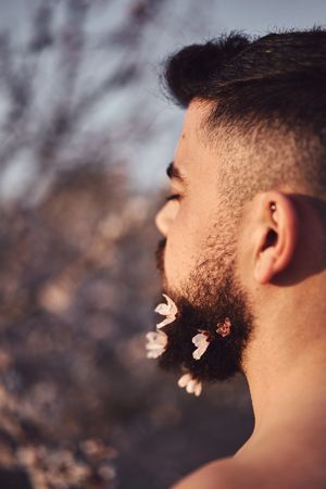 Man with flowers in beard