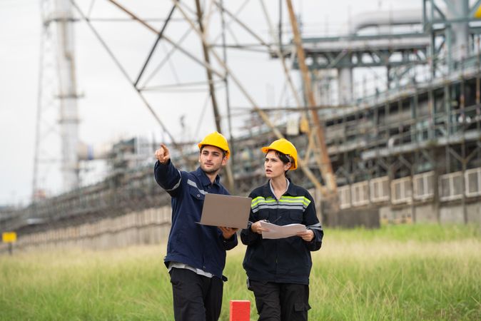 Engineer worker checking project at petrochemical factory or refinery oil plant industrial.