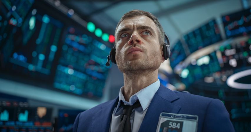 Portrait of a Stock Market Trader Working in a Stock Exchange Company.