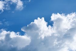 Blue sky and fluffy clouds