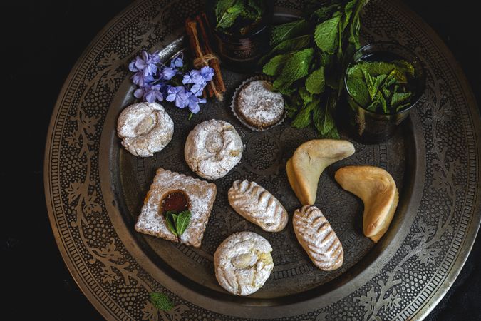 Traditional tea with mint and assorted Arab sweets
