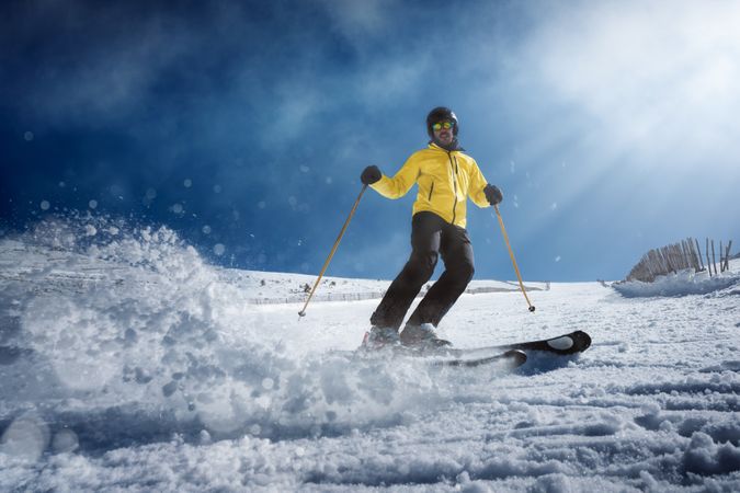 Man skiing on winter day