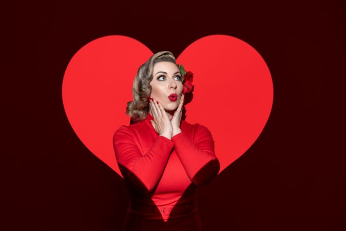 Retro style woman surrounded by a red heart shape