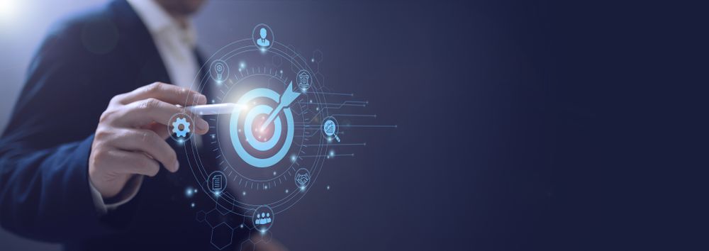 Digital marketing. Businessman touching darts aiming at the target center
