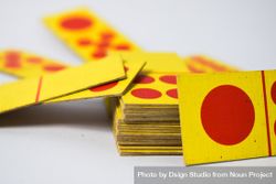 Close up of red and yellow domino cards 4ZeOYA