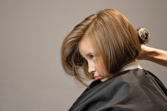 Child Modeling a Bob Haircut