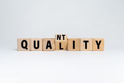 flip wooden blocks with quality and quantity words