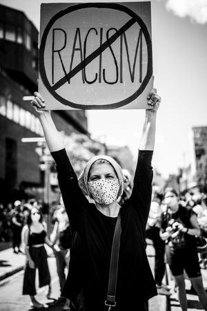 MONTREAL, QUEBEC, CANADA – June 7 2020- Person holding a sign during a black lives matter protest