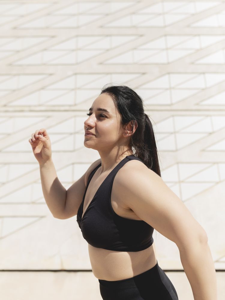 Portrait of a woman, happy, in a moment of dance and movements to relax and disconnect
