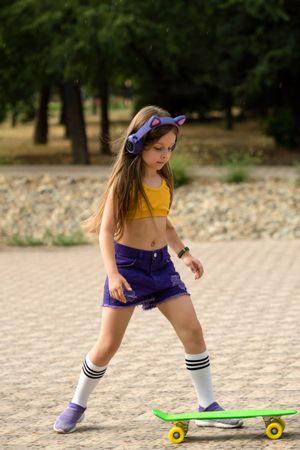 Female Child with Skateboard