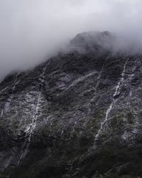 Dark and gloomy weather above mountain top