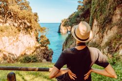 Female tourist contemplating picturesque landscape