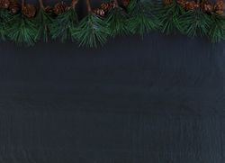 Christmas setting with fir tip branches on stone setting