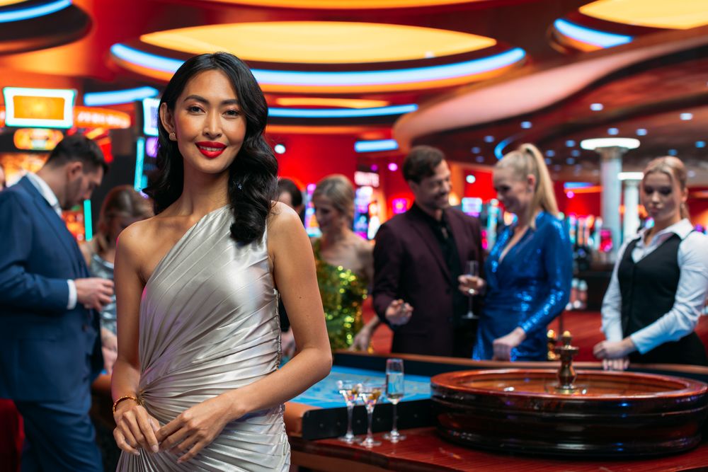 In a Modern Casino Hall: Asian Woman Posing Confidently