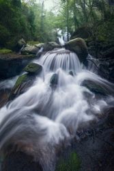 Majestic wild waterfall on rocks