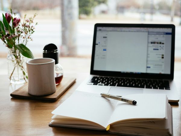 Flat Lay Workspace Laptop and Notebook