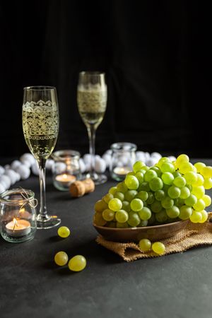 Glasses with wine and grapes