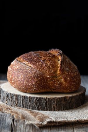Country sourdough bread on wood