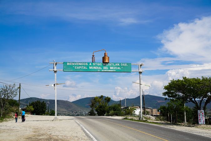 Directional road sign in daylight