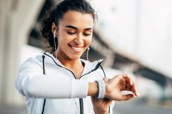 Close up of woman looking at her smartwatch