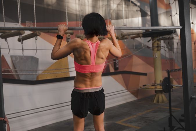 Athletic woman training in gym