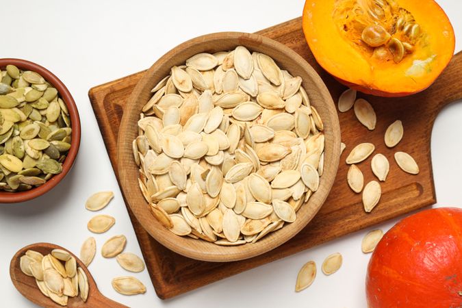 Cooking ingredients for fall season - pumpkin seeds, pumpkin