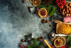 Top view of warm Christmas spices for mulled wine on counter with copy space