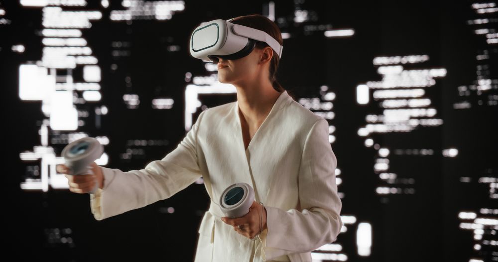Futuristic Businesswoman Wearing a Virtual Reality Headset and Using Controllers in a Futuristic Room with Cyberpunk Abstract Animation.