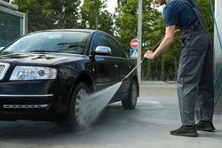 A man washes a car. Clear car concept